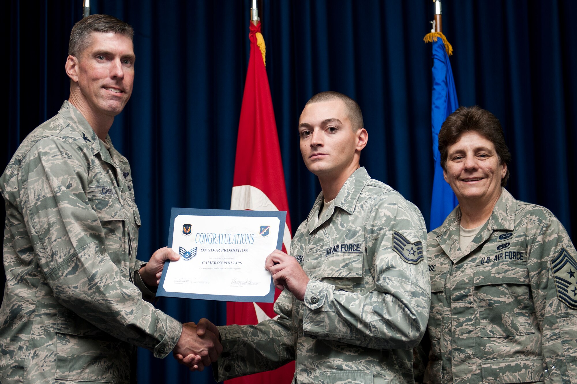 Cameron Phillips, 39th Logistics Readiness Squadron, is promoted to the rank of staff sergeant Sept. 30, 2011, at the Club Complex ballroom at Incirlik Air Base, Turkey. (U.S. Air Force photo by Tech. Sgt. Michael B. Keller/Released)