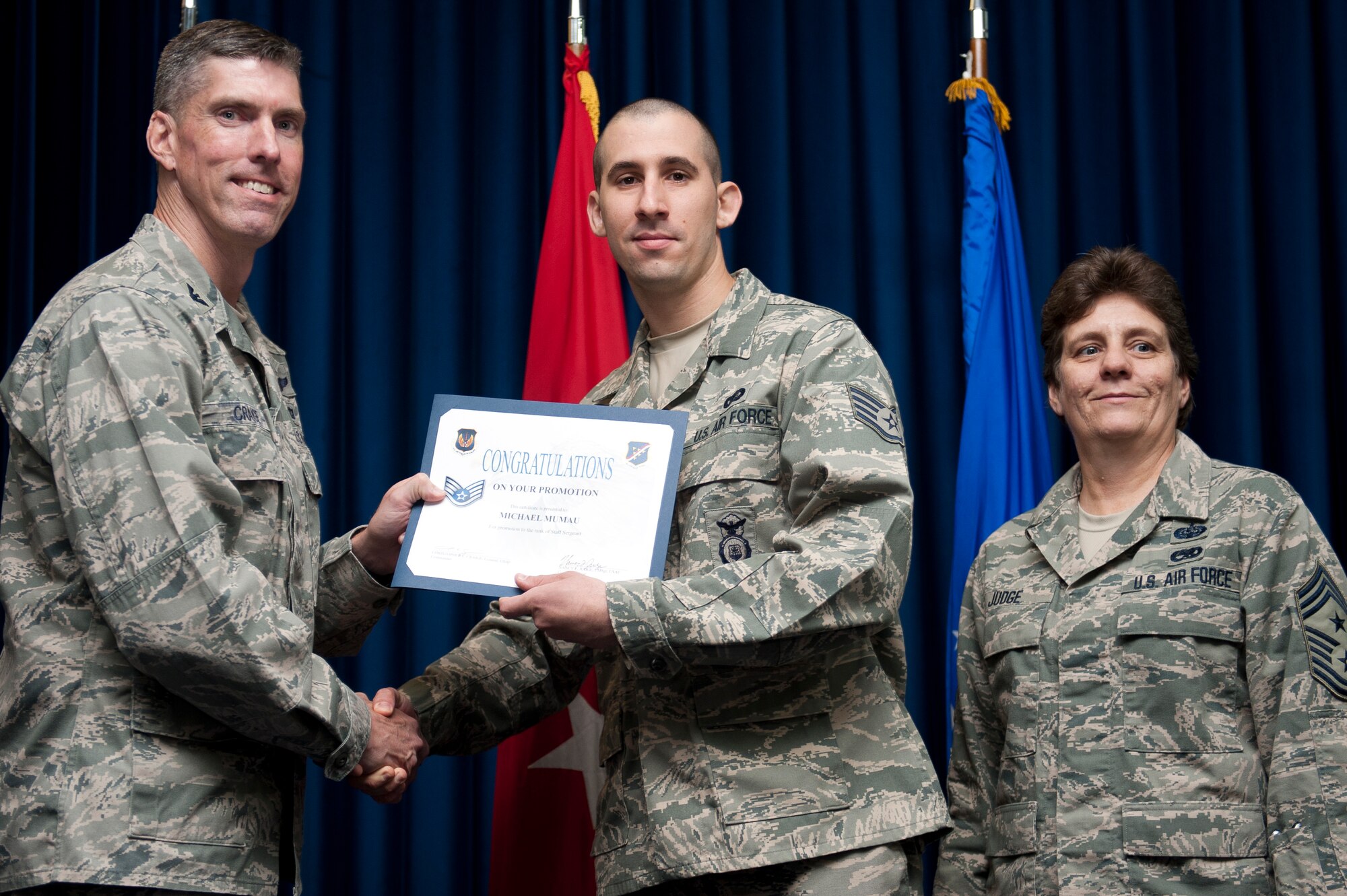 Michael Mumau, 39th Security Forces Squadron, is promoted to the rank of staff sergeant Sept. 30, 2011, at the Club Complex ballroom at Incirlik Air Base, Turkey. (U.S. Air Force photo by Tech. Sgt. Michael B. Keller/Released)