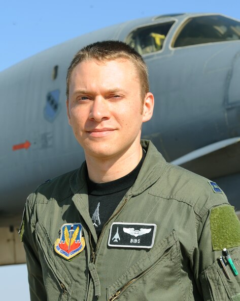 U.S. Air Force Capt. Charles Armstrong, 77th Weapons Squadron student, poses in front of a B-1 Bomber July 22, 2011, on the flightline at Dyess Air Force Base, Texas. Recently, Armstrong along with the rest of class 11B, completed the Weapons Employment phase of the course. (U.S. Air Force photo by Tech. Sgt. Darcie Ibidapo)
