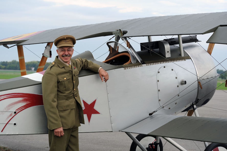 DAYTON, Ohio -- A reenactor stands with his aircraft at the World War I Dawn Patrol Rendezvous from Sept. 23-25, 2011, at the National Museum of the U.S. Air Force. (U.S. Air Force photo)