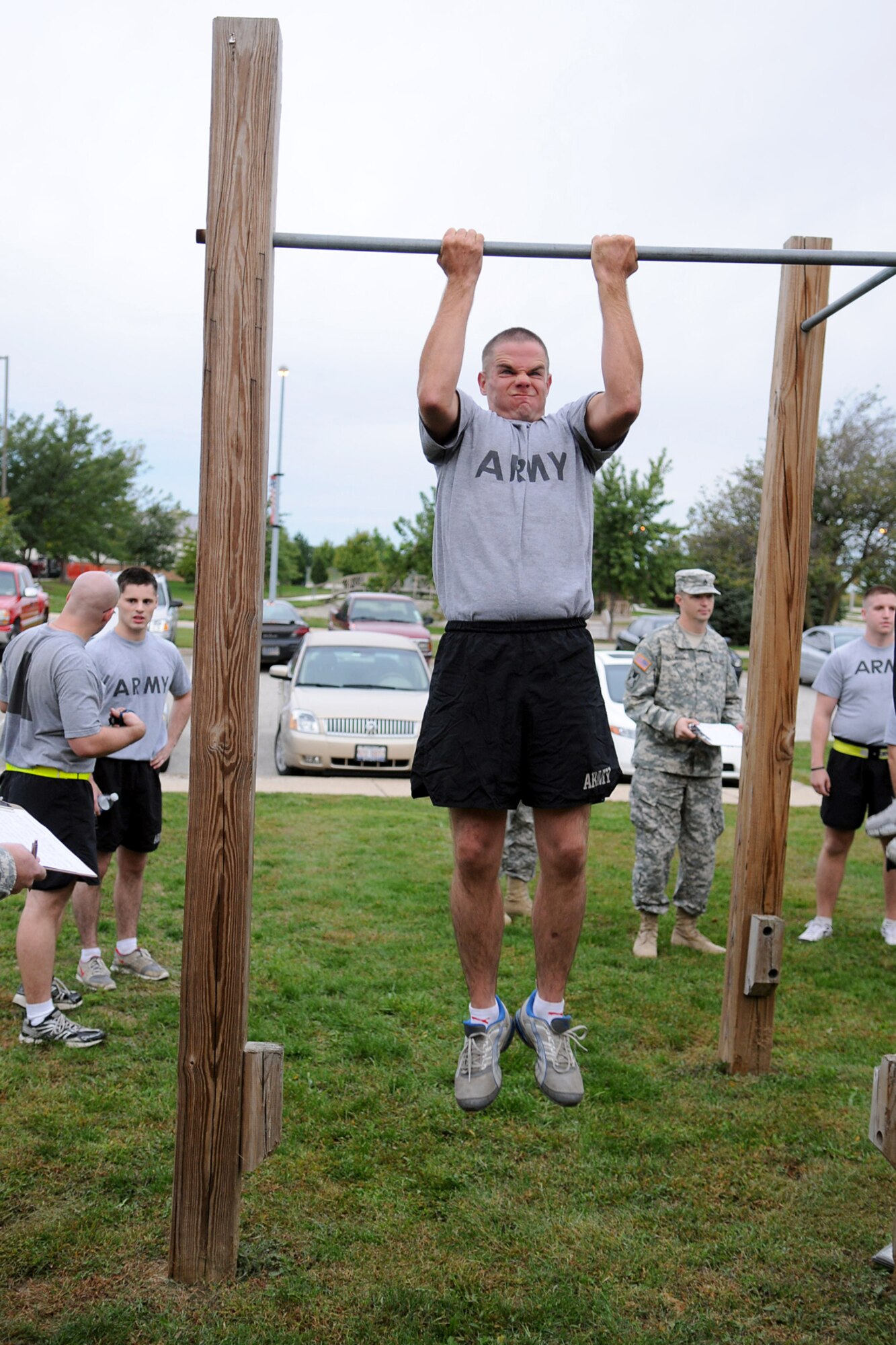 GRISSOM AIR RESERVE BASE, Ind. -- Sgt. Scott Sharp, 316th Tactical Psychological Operations Company, reaches his maximum reps in pull-ups during the physical assessment test. The PT test was just one of the events that took place during the 2nd annual PSYOP Stakes Sept. 16. The Soldiers took part in the two-day event to assess their strengths and weaknesses in various areas. (U.S. Air Force photo/Senior Airman Jami K. Lancette)