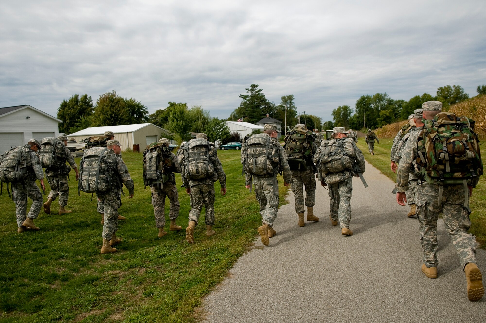 GRISSOM AIR RESERVE BASE, Ind. -- Soldiers from the 316th Tactical Psychological Operations Company here begin their 10-mile ruck march Sept. 16. The ruck march was just one of the events that took place during the 2nd annual PSYOP Stakes. The Soldiers took part in the two-day event to assess their strengths and weaknesses in various areas. (U.S. Air Force photo/Senior Airman Jami K. Lancette)