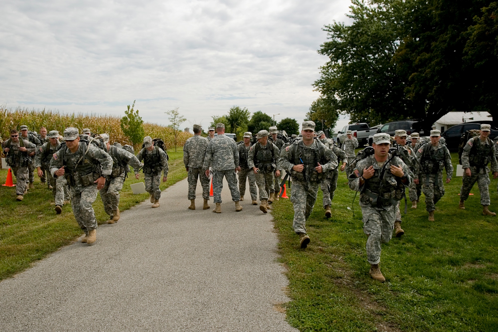 GRISSOM AIR RESERVE BASE, Ind. -- Soldiers from the 316th Tactical Psychological Operations Company here begin their 10-mile ruck march Sept. 16. The ruck march was just one of the events that took place during the 2nd annual PSYOP Stakes. The Soldiers took part in the two-day event to assess their strengths and weaknesses in various areas. (U.S. Air Force photo/Senior Airman Jami K. Lancette)