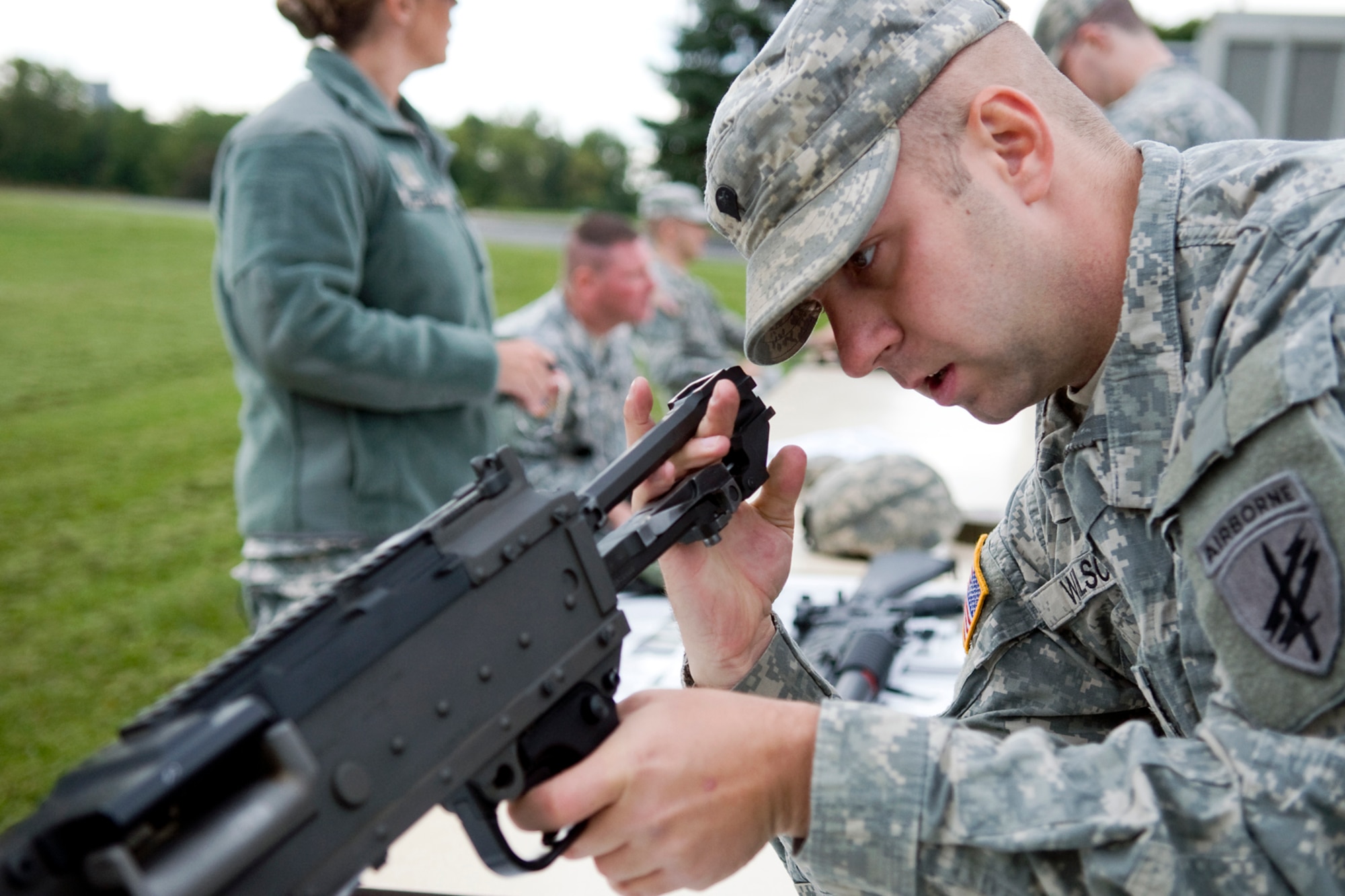 GRISSOM AIR RESERVE BASE, Ind. -- Spc. Wilson Randall, 316th Tactical Psychological Operations Company, reassembles an M-24OB machine gun during the 2nd annual PSYOP Stakes Sept. 16. The Soldiers took part in the two-day event to assess their strengths and weaknesses in various areas. (U.S. Air Force photo/Senior Airman Jami K. Lancette)