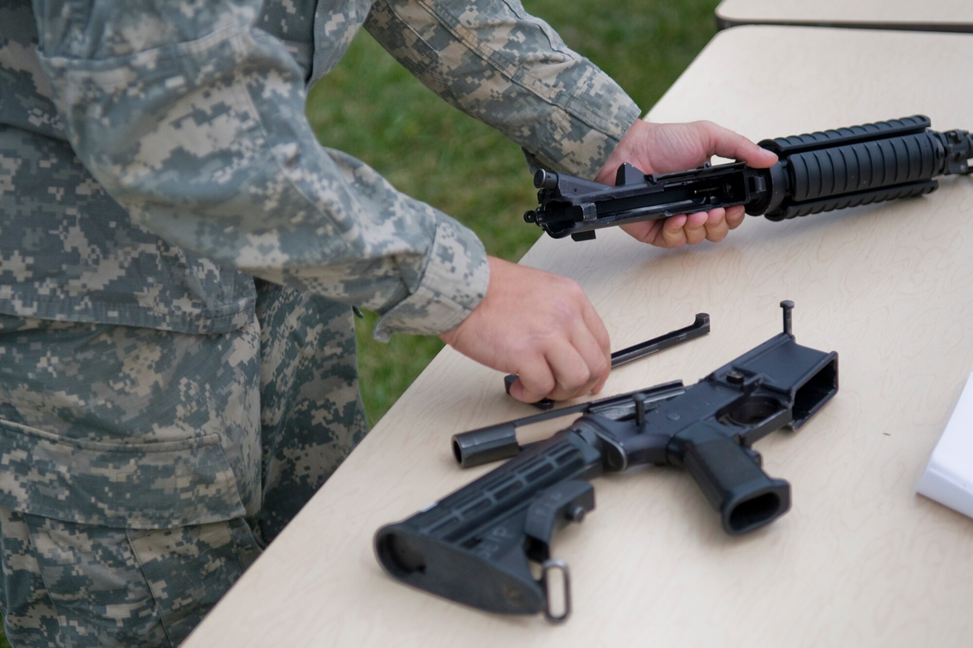 GRISSOM AIR RESERVE BASE, Ind. -- A Soldier reassembles an M-4 carbine rifle during the 2nd annual Psychological Operations Stakes Sept. 14. The Soldiers took part in the two-day event to assess their strengths and weaknesses in various areas. (U.S. Air Force photo/Senior Airman Jami K. Lancette)