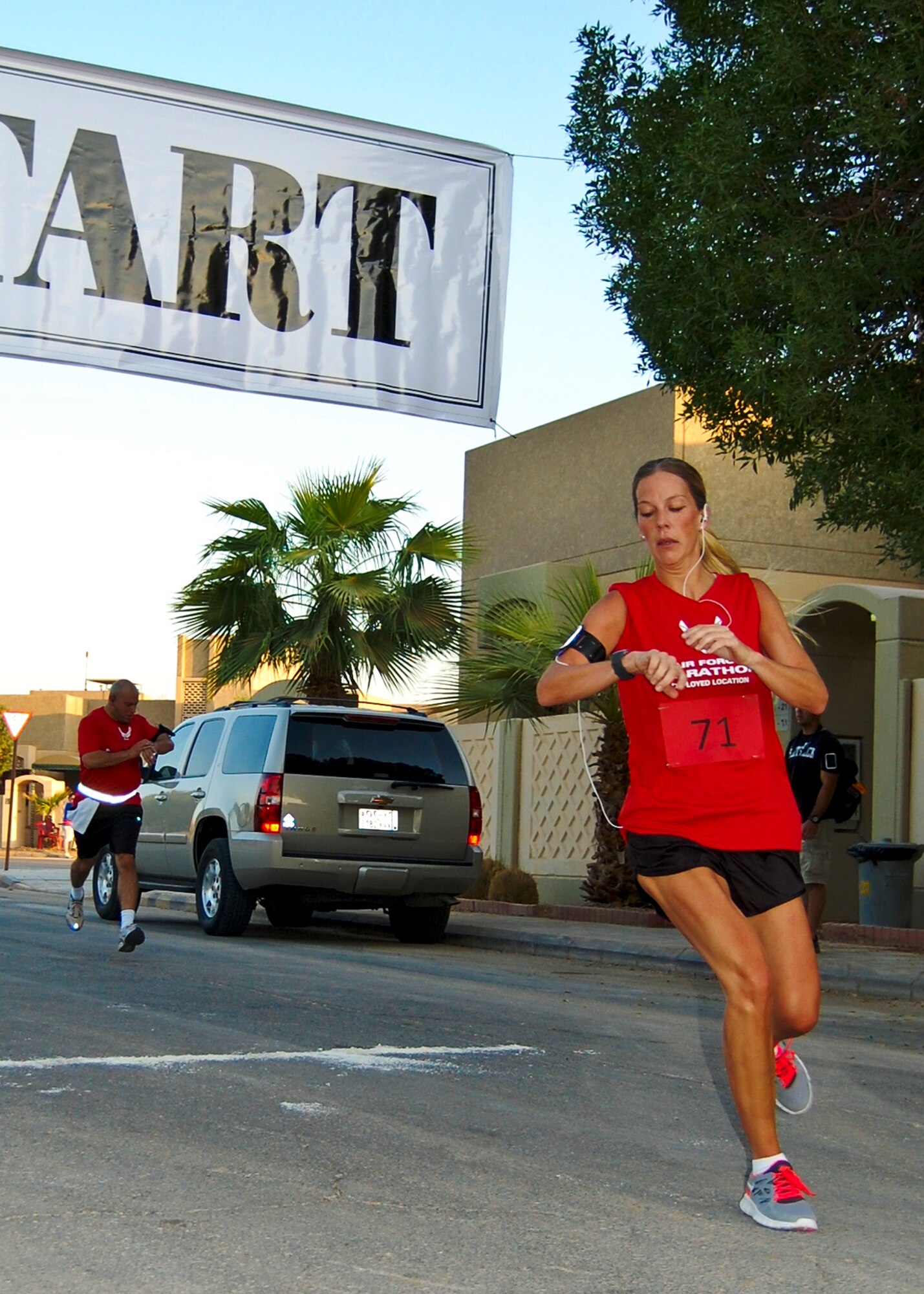 Tech. Sgt. Sarah Jolly, a deployed Airman with the 96th Security Forces Squadron, completes the 10K run during an Air Force Marathon event held at Eskan Village, Saudi Arabia.  She was the first among females and 10th overall in the event.  (Courtesy photo)