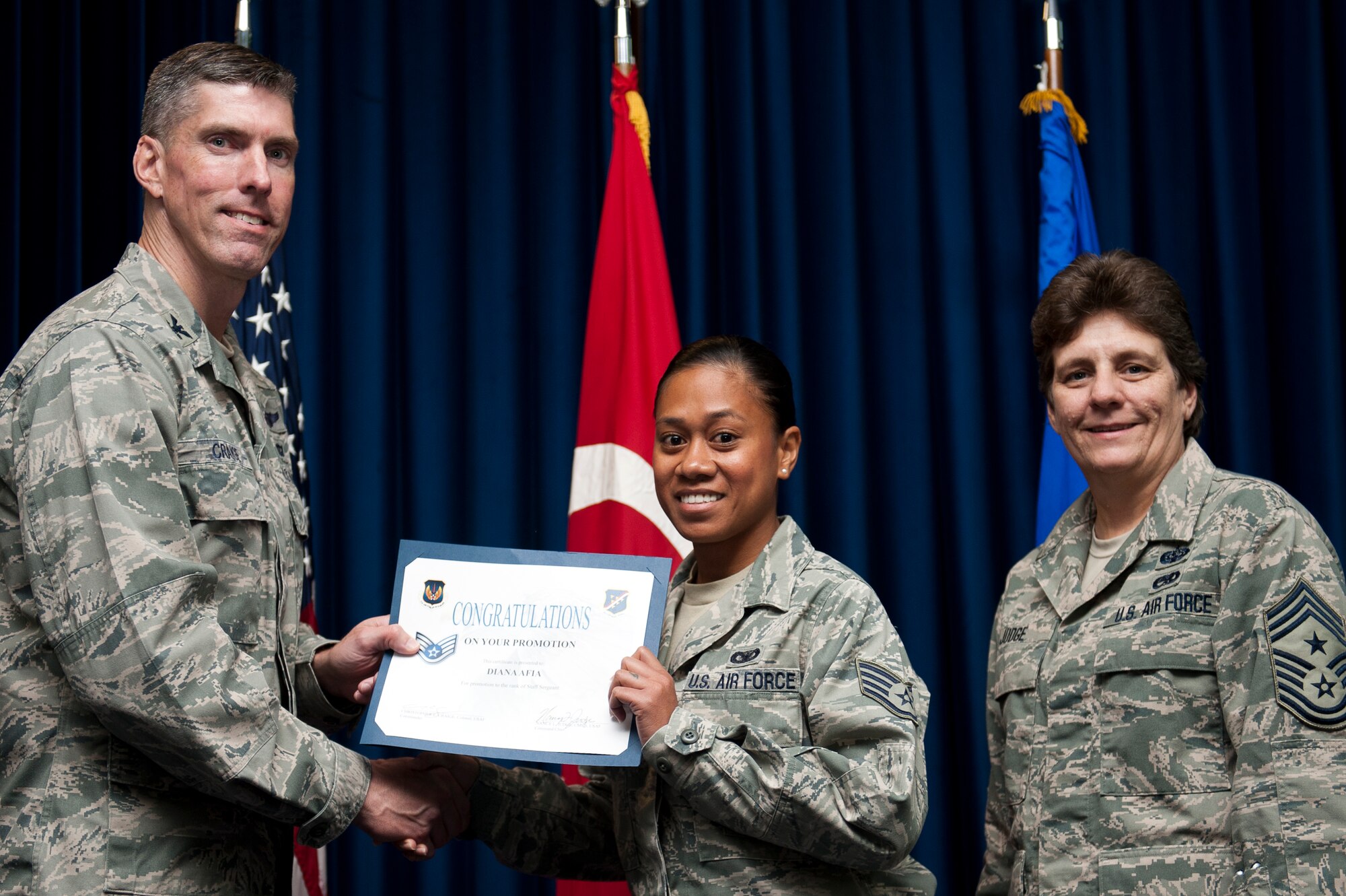Diana Afia, 39th Security Forces Squadron, is promoted to the rank of staff sergeant Sept. 30, 2011, at the Club Complex ballroom at Incirlik Air Base, Turkey. (U.S. Air Force photo by Tech. Sgt. Michael B. Keller/Released)