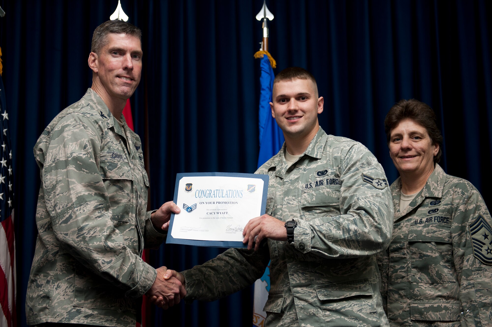 Cacy Wyatt, 39th Security Forces Squadron, is promoted to the rank of senior airman Sept. 30, 2011, at the Club Complex ballroom at Incirlik Air Base, Turkey. (U.S. Air Force photo by Tech. Sgt. Michael B. Keller/Released)