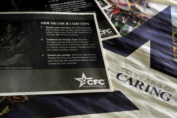 MISAWA AIR BASE, Japan – Combined Federal Campaign catalogs and donation slips are set out during the 50th Anniversary of the CFC celebration here, Oct. 3. Each fall, millions of Federal employees are invited to donate to one or more of the 40,000 plus charities during the campaign. (U.S. Air Force photo/Staff Sgt. Nathan Lipscomb)