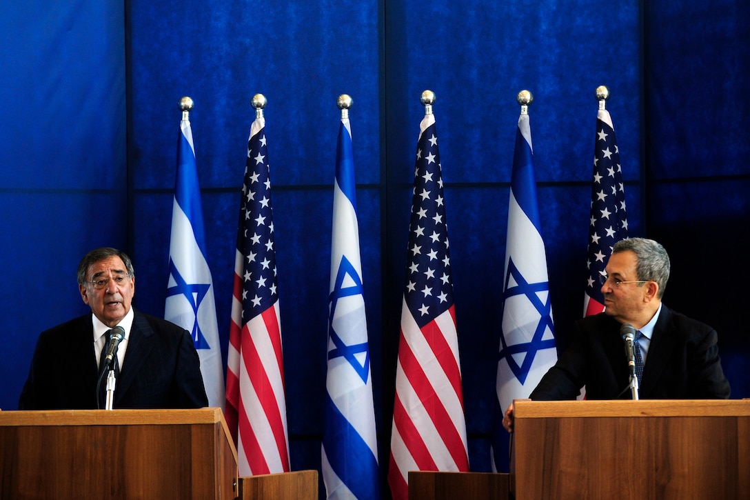 U.S. Defense Secretary Leon E. Panetta, left, conducts a press ...