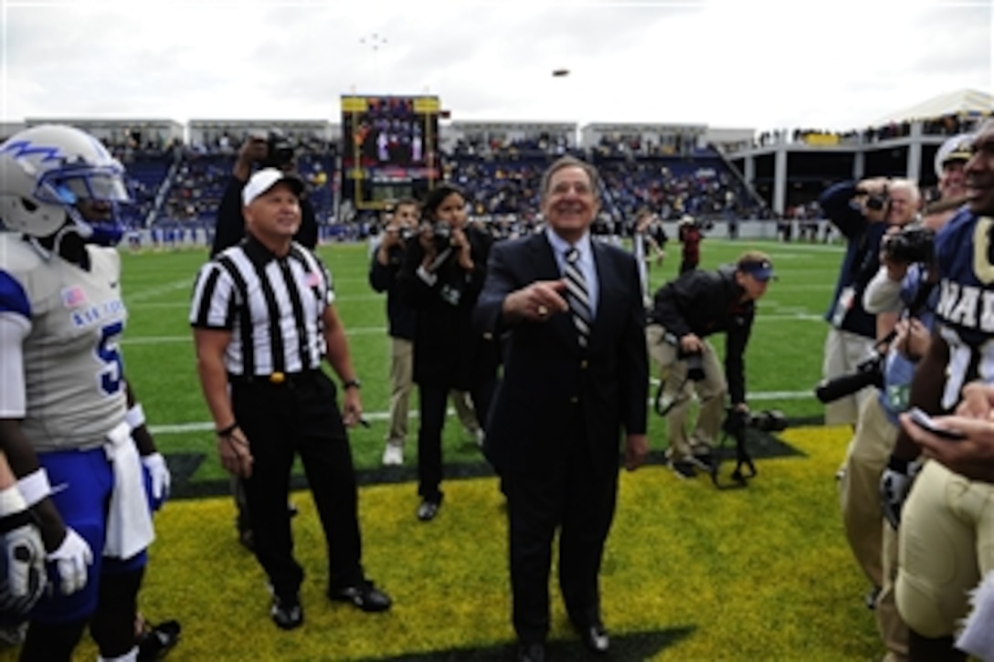 Secretary of Defense Leon E. Panetta conducts the Ronald Reagan Centennial National Football Coin Toss in honor of Reagan's 100th birthday before the Air Force vs. Navy football game at the U.S. Naval Academy in Annapolis, Md., on Oct. 1, 2011.  The Air Force Falcons defeated the Navy Midshipmen in overtime, 35-34.  