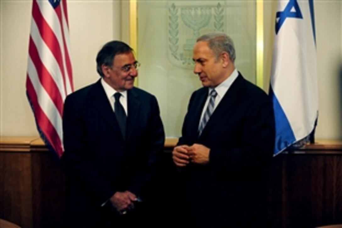 U.S. Defense Secretary Leon E. Panetta, left, talks with Israeli Prime Minister Benjamin Netanyahu in Tel Aviv, Israel, Oct. 3, 2011. Panetta is in Israel to discuss a variety of mutual defense issues. 