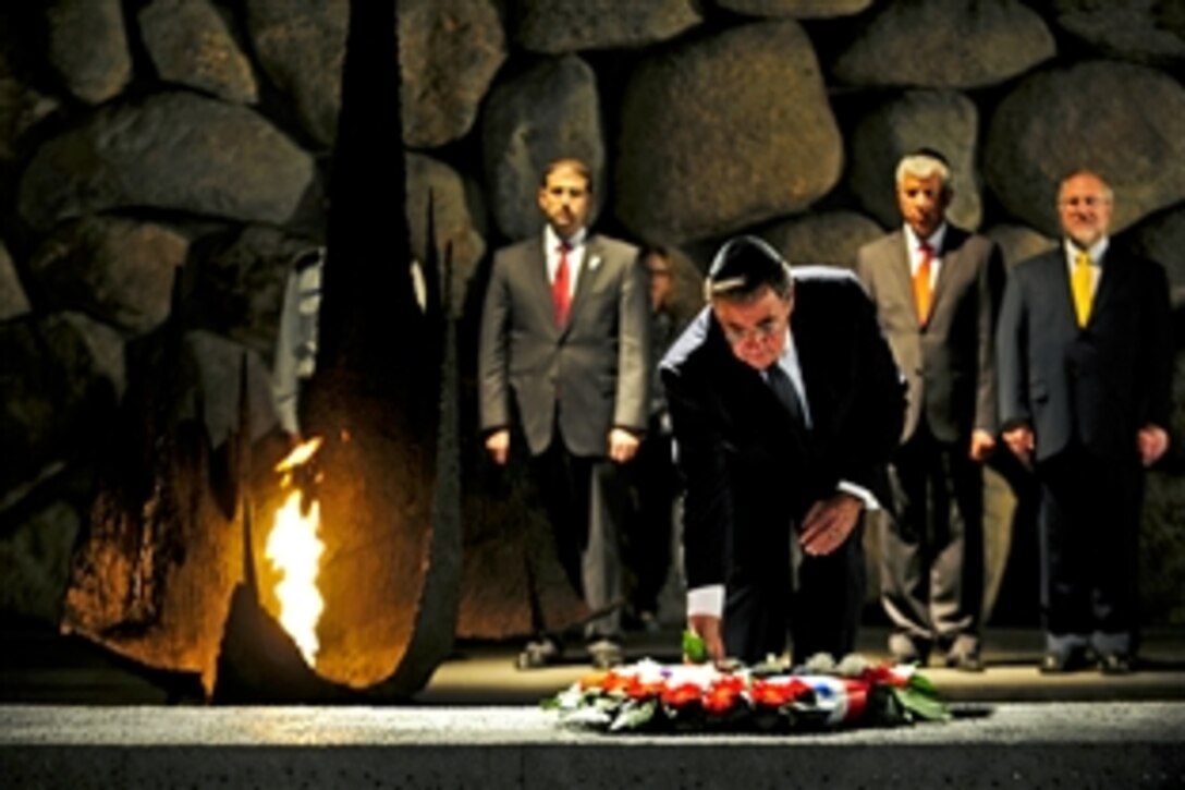 U.S. Defense Secretary Leon E. Panetta takes part in a wreath-laying ceremony at the Holocaust Museum at Yad Vashem, Israel, in remembrance of six million Jews murdered during the Holocaust, Oct. 3, 2011.