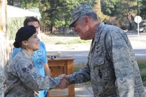 MINOT, N.D. -- Maj. Gen. Donald Alston, 20th Air Force commander, meets with Senior Airman Ashley Woods, 91st Security Forces Group team member, at her home Sept. 28. Woods met with the general and conducted a tour of her home, which was recently flooded. The 20th Air Force commander and command chief visited Team Minot Airmen here as part of a base and downtown community tour focused on understanding the state of flood recovery efforts. (U.S. Air Force Photo/Senior Airman Aaron-Forrest Wainwright) 