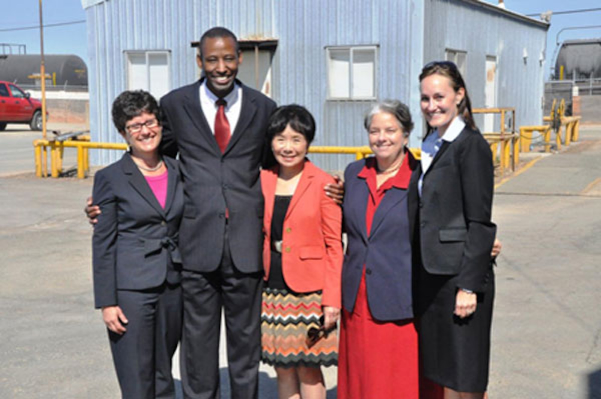 Speakers gather after the McClellan event to celebrate privatized cleanup success at the former base. (l to r) Debbie Raphael, Director, Calif. Department of Toxic Substance Control Board; Timothy Bridges, Deputy Assistant Secretary of the Air Force for Environment, Safety and Occupational Health; Congresswoman Doris Matsui, Calif. 5th District; Jane Diamond, Superfund Director, US EPA Region 9; Katherine Hart, Board Chair of the Regional Water Quality Control Board.     (Photo by Scott Johnston, AFRPA)