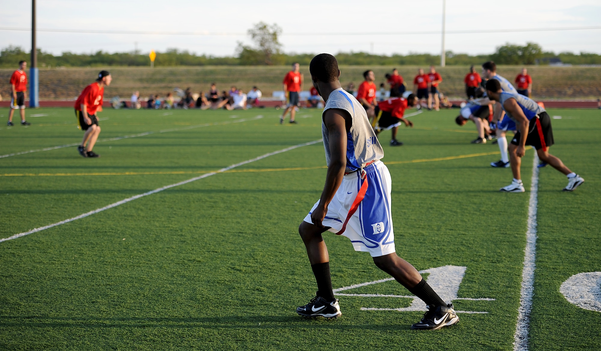 GOODFELLOW AIR FORCE BASE, Texas -- The 316th Training Squadron Sharks form up on the line of scrimmage during the intramural flag football game against the 1st Responders Sept. 29. The Sharks defeated the 1st Responders, 18-7. (U.S. Air Force photo/Airman 1st Class Michael Smith)