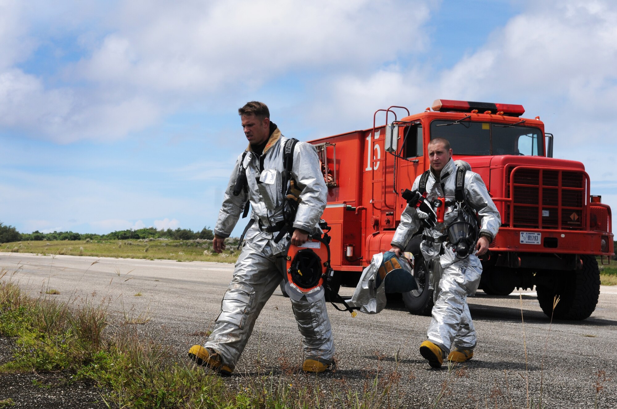 ANDERSEN AIR FORCE BASE, Guam – Firefighters from the 36th Civil Engineer Squadron arrive on scene to the major accident response exercise, Oct.3. Upon arriving, the firefighters will receive inputs from the on-scene command and control and begin operations. (U.S. Air Force photo/ Senior Airman Carlin Leslie)
