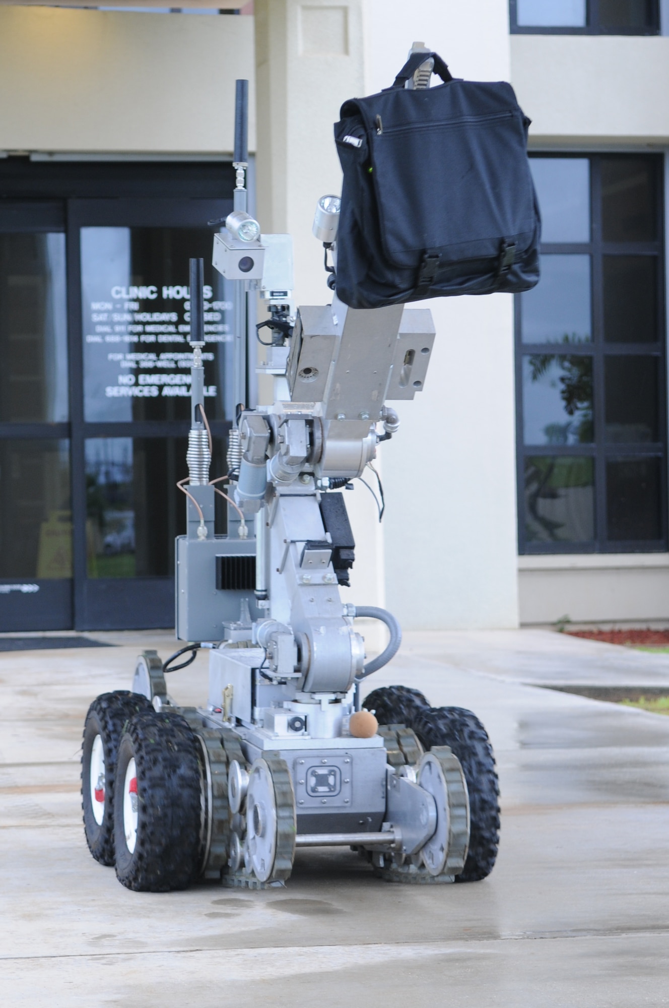 ANDERSEN AIR FORCE BASE, Guam –A REMOTEC F6A robot, operated by 36th Civil Engineer Squadron Explosive Ordnance Disposal Unit Airmen, moves an exercise improvised explosive device to a safer inspection location, Oct. 3., during an Operational Readiness Exercise here. The robot is used to safely take suspicious packages to a safe location, away from buildings and personnel, in order to safely inspect it. (U.S. Air Force photo/ Senior Airman Carlin Leslie))