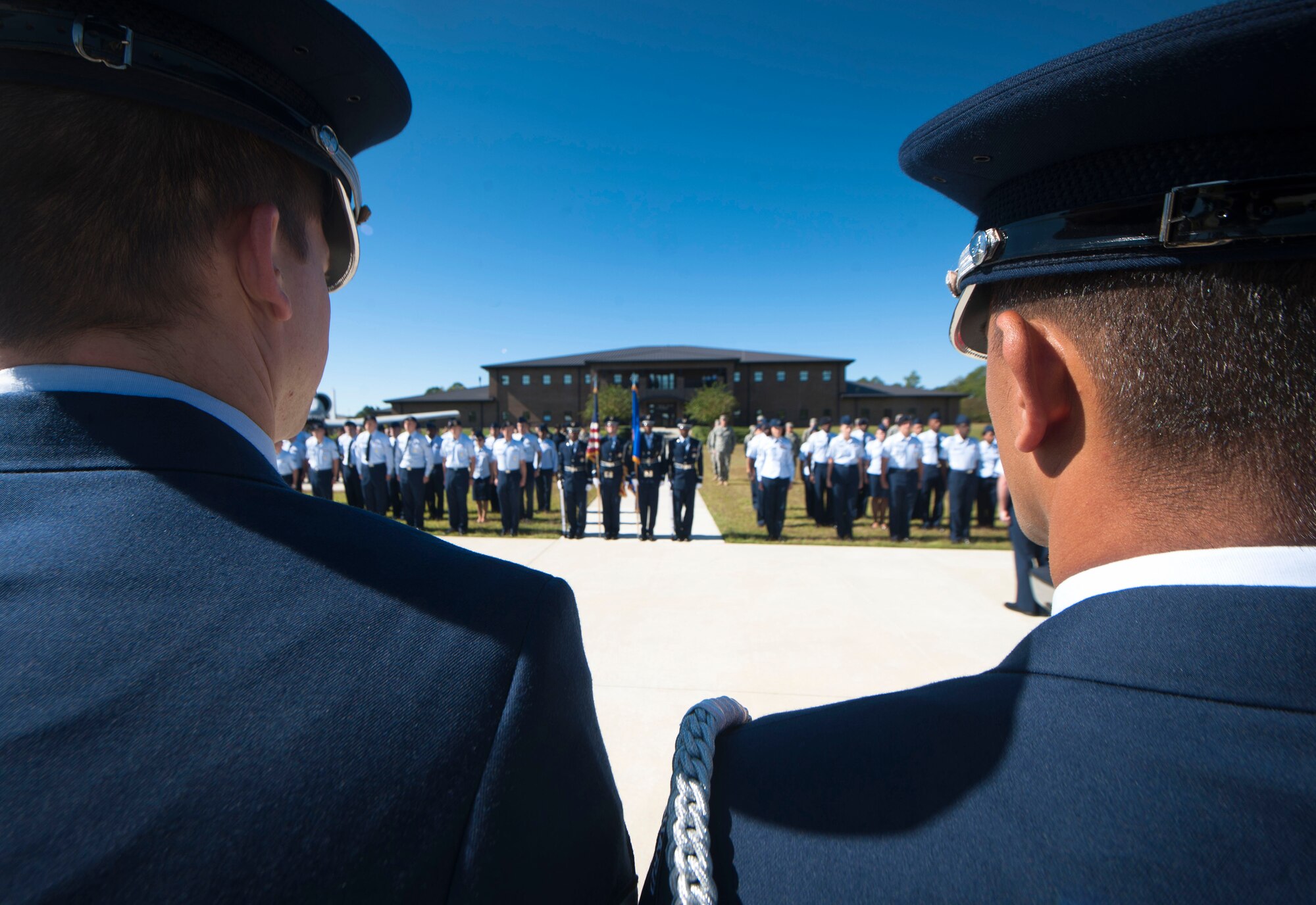 The Moody Air Force Base Honor Guard and Airmen from various agencies on base stand at attention during the arrival of a piece of World Trade Center steel at Moody AFB, Ga., Oct. 3, 2011. Paul Jockimo, a firefighter from Westchester, N.Y., escorted the 111-pound steel artifact to Moody from New York. Sections of the WTC remains are spread across the country as a reminder of the tragic events of Sept. 11, 2001. (U.S. Air Force photo by Airman 1st Class Joshua Green/Released) 
