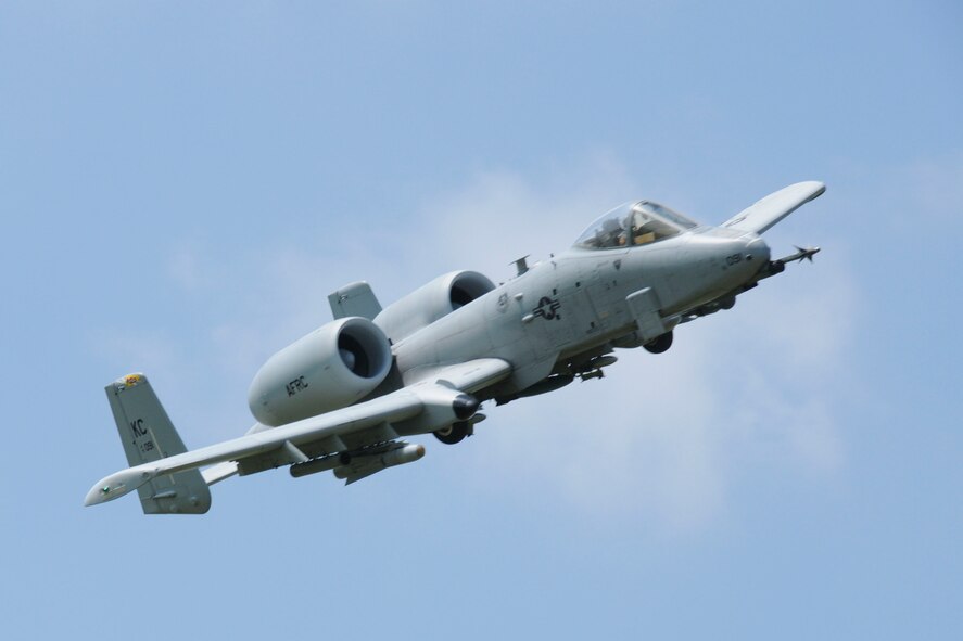 An A-10C Thunderbolt from Whiteman AFB makes a low level pass during the 2011 Smoky Hill Open House.
