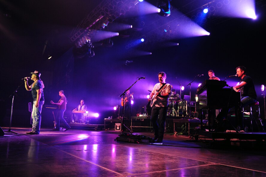 MINOT, N.D. -- Trace Adkins, a country music singer, and his band, perform for the Minot community at the Norsk Hostfest here Sept. 29. The 34th annual Norsk Hostfest celebrates the Scandinavian heritage of the Minot community and surrounding areas, bringing together people from around the world. (U.S. Air Force photo/Senior Airman Michael J. Veloz)