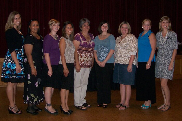 Local area Ombudsman pose for a group photo during the Ombudsman Appreciation Luncheon held Sept. 29 at Joint Base Charleston - Weapons Station. The Ombudsmen were celebrating 41 years of the program which provides a vital link between a servicemember's family and their command. (U.S. Navy photo/Kim Brown)