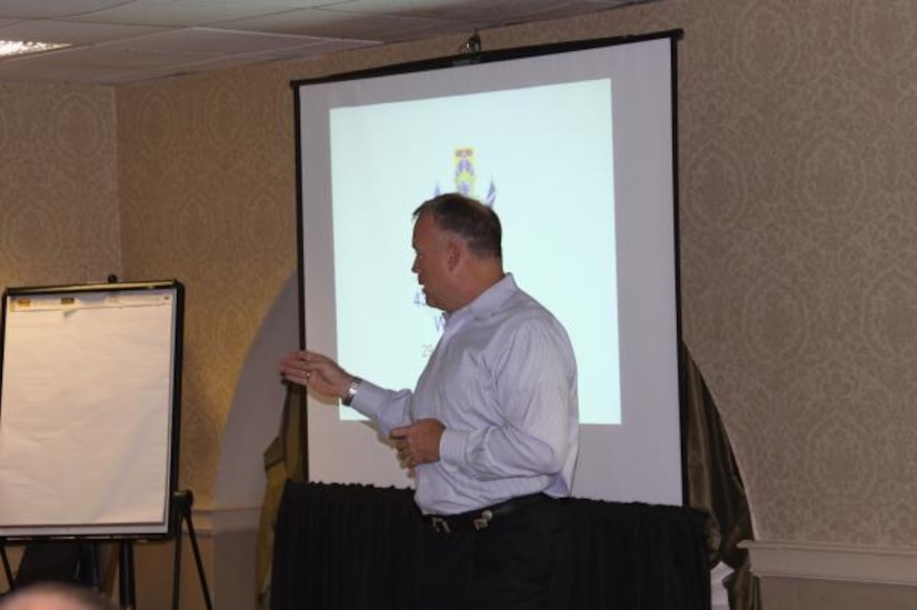 Colonel Erik Hansen discusses Strategic Alignment and Deployment with other senior 437th Airlift Wing leaders this past September. SA&D is a long-term planning method that enables Airmen at every level to tackle tasks driven by command objectives, measures and critical targets. Hansen is the 437th AW commander. (courtesy photo) 