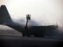 Maintenance Airmen deice a C-130 Hercules with the 416th Air Expeditionary Group at Karshi-Khanabad Air Base, Uzbekistan, on Feb. 19, 2005, in preparing the plane for an Operation Enduring Freedom mission. (U.S. Air Force Photo/Master Sgt. Scott T. Sturkol)