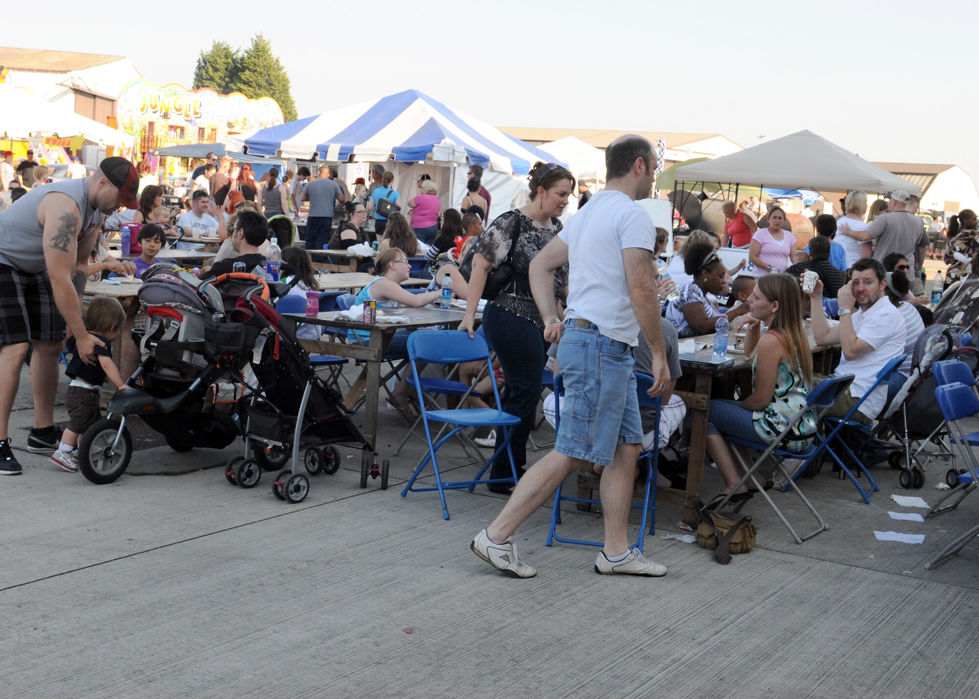 RAF LAKENHEATH, England – Members from RAFs Mildenhall and Lakenheath enjoy a variety of food at the RAF Lakenheath Holiday Bazaar Oct. 2, 2011.  Throughout the year, four bazaars are held between the two bases, which give base members an opportunity to browse vendor’s items from throughout the United Kingdom and Europe.  The Yuletide Bazaar will be held next at RAF Mildenhall in November.  (U.S. Air Force photo by Staff Sgt. Tabitha M. Lee)