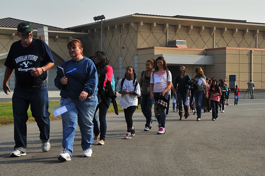 During an Emergency Management Exercise, Osan responders reacted to a simulated A-10 that collided with a CH-47, which then crashed into a static display during an airshow, here Oct. 5.  Fifth-graders from Osan Middle School helped with the exercise, giving it a 'real-feel'.  The students were moulaged up and spread across the flight-line serving as victims for first responders with wounds ranging from smoke inhalation to protruding insides.  This exercise gave Osan responders a chance to shine while responding to a very possible emergency scenario.  (U.S. Air Force Photo by/Staff Sgt. Daylena Gonzalez)