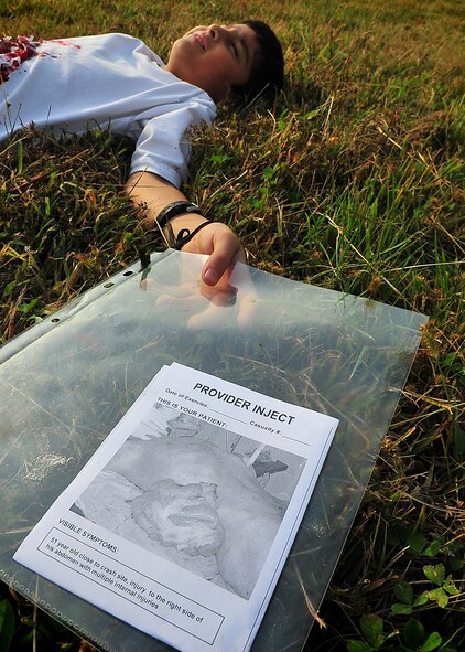 During an Emergency Management Exercise, Osan responders reacted to a simulated A-10 that collided with a CH-47, which then crashed into a static display during an airshow, here Oct. 5.  Fifth-graders from Osan Middle School helped with the exercise, giving it a 'real-feel'.  The students were moulaged up and spread across the flight-line serving as victims for first responders with wounds ranging from smoke inhalation to protruding insides.  This exercise gave Osan responders a chance to shine while responding to a very possible emergency scenario.  (U.S. Air Force Photo by/Staff Sgt. Daylena Gonzalez)