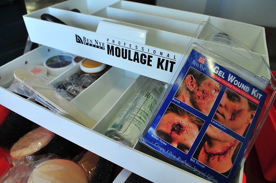 During an Emergency Management Exercise, Osan responders reacted to a simulated A-10 that collided with a CH-47, which then crashed into a static display during an airshow, here Oct. 5.  Fifth-graders from Osan Middle School helped with the exercise, giving it a 'real-feel'.  The students were moulaged up and spread across the flight-line serving as victims for first responders with wounds ranging from smoke inhalation to protruding insides.  This exercise gave Osan responders a chance to shine while responding to a very possible emergency scenario.  (U.S. Air Force Photo by/Staff Sgt. Daylena Gonzalez)