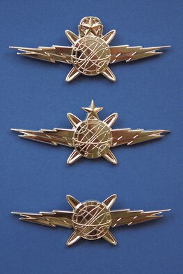 From bottom: The Air Force Academy's basic, senior and master cyberwarfare badges. (U.S. Air Force photo/Maj. Patrick Baldwin)