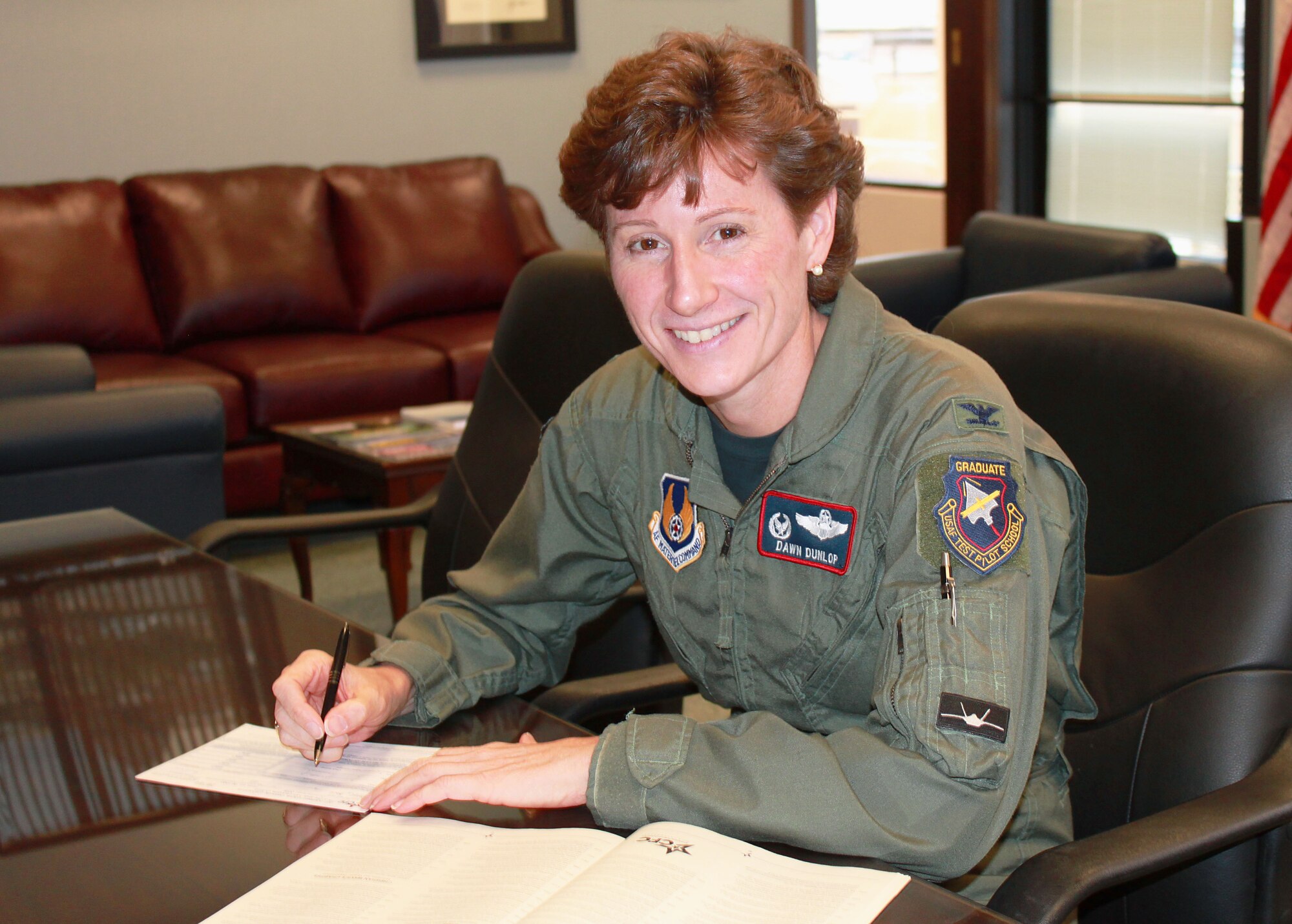 Col. Dawn Dunlop, commander, 412th Test Wing, supports the Combined Federal Campaign each year by verifying and updating her gift.
 
"Our people contribute to this nation everyday with their service," said Col. Dunlop. "But for those of us that like to give financially, this is an easy and convenient way to support the charity of our choosing. It's one stop shopping, you fill out the form and they can take it right out of your check. What's easier than that?"

(U.S. Air Force photo by Meredith Mingledorff)
