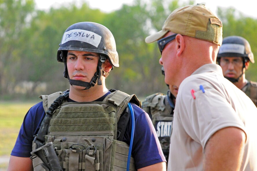 LAUGHLIN AIR FORCE BASE, Texas -- J.D. Robertson, Texas Ranger Special Operations commander, speaks to Texas Department of Public Saftey members during a special weapons and tactics tryout here Sept. 28. Laughlin supplied Texas DPS with a training location for the week-long exercise displaying the good working relationships between the agencies. (U.S. Air Force photo/Senior Airman Scott Saldukas)