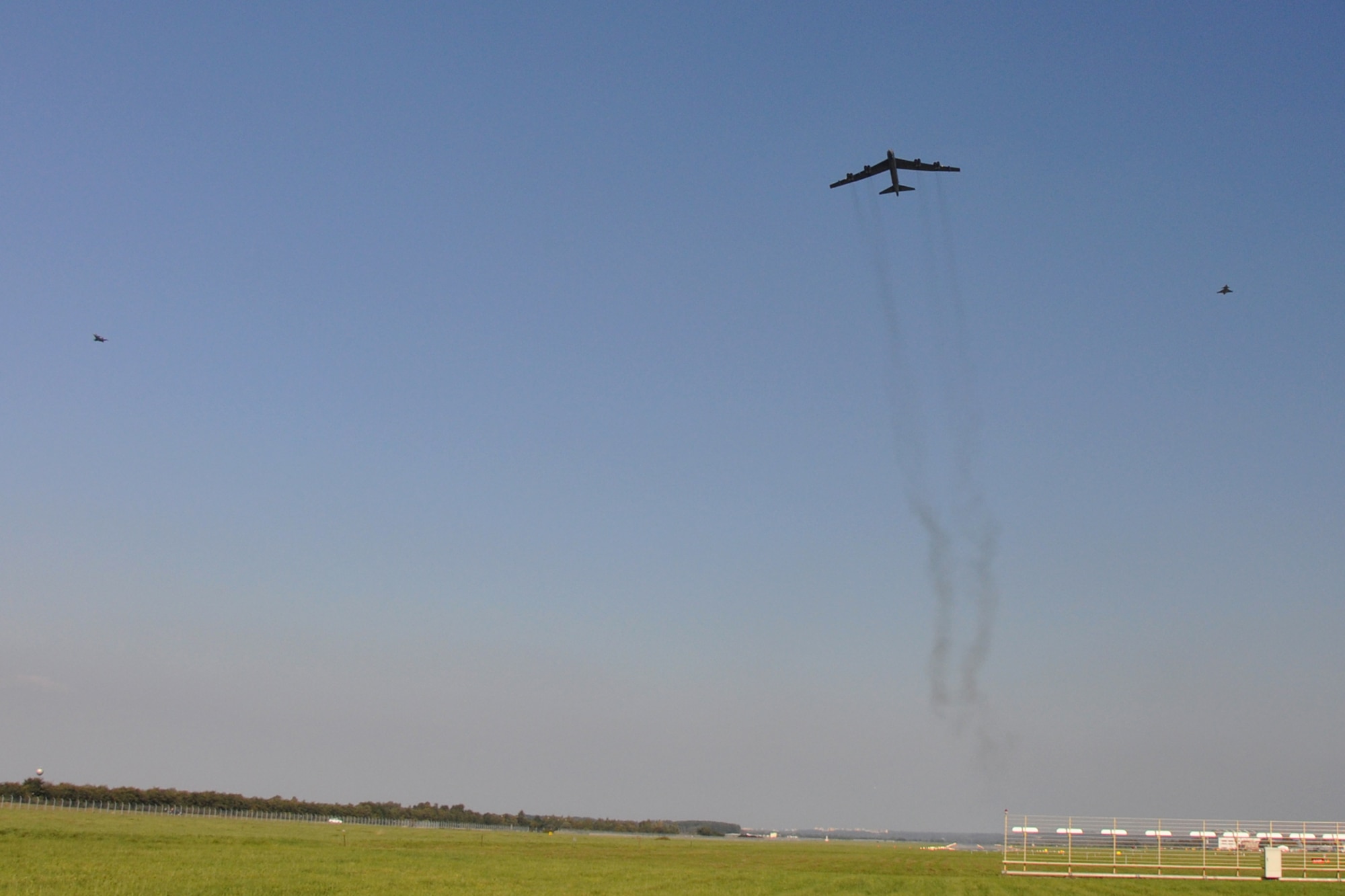 An Air Force Reserve Command B-52 Stratofortress from the 93rd Bomb Squadron, 307th Bomb Wing, Barksdale Air Force Base, La., and two Saab JAS 39C Gripens from the Czech Republic air force fly in formation over the Ostrava airport in the Czech Republic, Sept. 26, 2011. The Gripens were piloted by 1st Lt Kamil Kopác and 1st Lt Vladimír Málek. (U.S. Air Force photo by Tech. Sgt. Jeff Walston/Released)