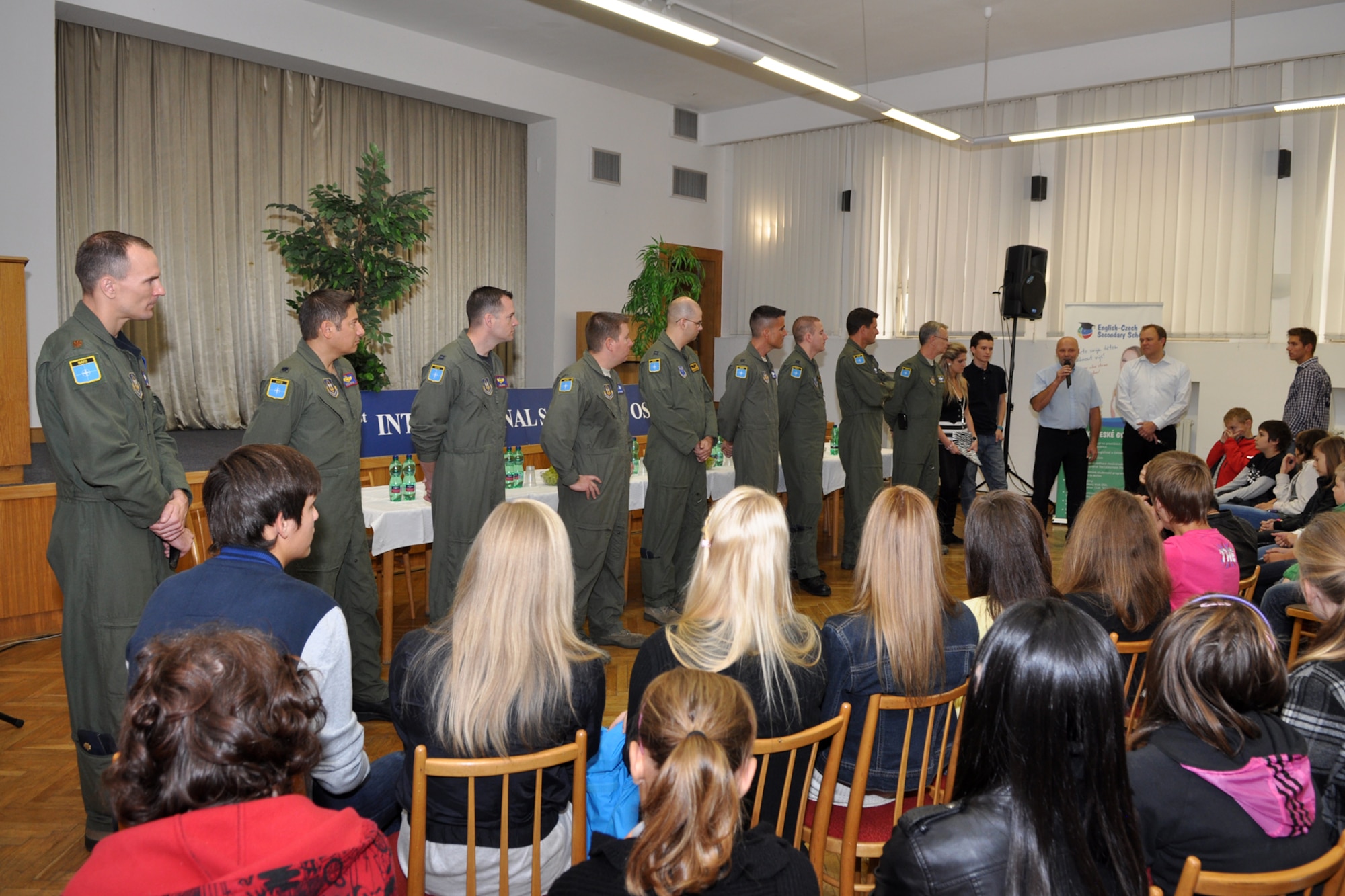 A group of Airmen from the 307th Bomb Wing and 11th Bomb Squadron, Barksdale Air Force Base, La., take time to talk with students at the 1st International School of Ostrava in the Czech Republic, Sept. 23, 2011. The Airmen were in the Czech Republic supporting the 11th Annual NATO Days in Ostrava air show, which is the largest air, military and security show in Central Europe. (U.S. Air Force photo by Tech. Sgt. Jeff Walston/Released)