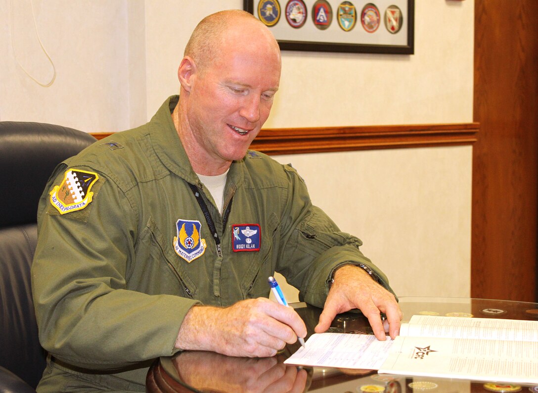 “This is a good thing,” said Brig. Gen. Robert C. Nolan II, commander, Air Force Flight Test Center. “It’s an opportunity to support good causes and I’ve seen it help our very own community through things like wounded warrior care.” 

General Nolan renewed his annual contribution and encouraged others to consider doing the same, Sept. 28 here. (U.S. Air Force photo by Meredith Mingledorff) 
