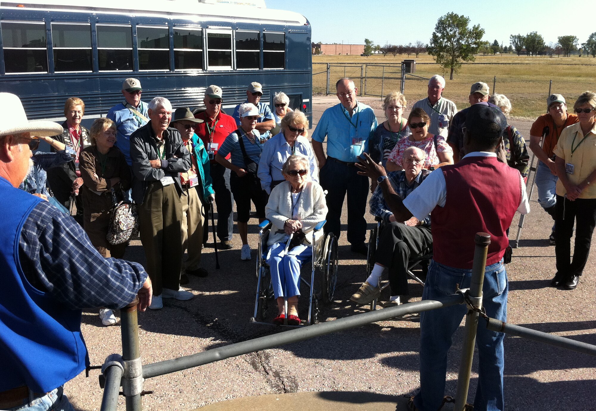 Eight surviving veterans of the 509th Composite Group along with their friends and family listen to a South Dakota Air and Space Museum tour guide explain the outdoor elements of the decommissioned training Minuteman missile silo at Ellsworth Air Force Base, S.D., Sept. 28, 2011. The veterans were visiting the base during their annual week-long reunion, which has been happening for more than 20 years. (U.S. Air Force photo by Tech. Sgt. Nathan Gallahan/Released)