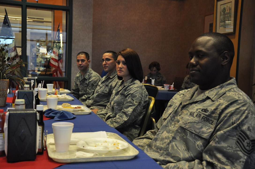 Airmen from the 315th Airlift Wing listen as Lt. Gen. Charles Stenner, AFRC commander, speaks to them during breakfast Oct. 4, 2011 at Joint Base Charleston, S.C. (U.S. Air Force photo\Staff Sgt. Shane Ellis)