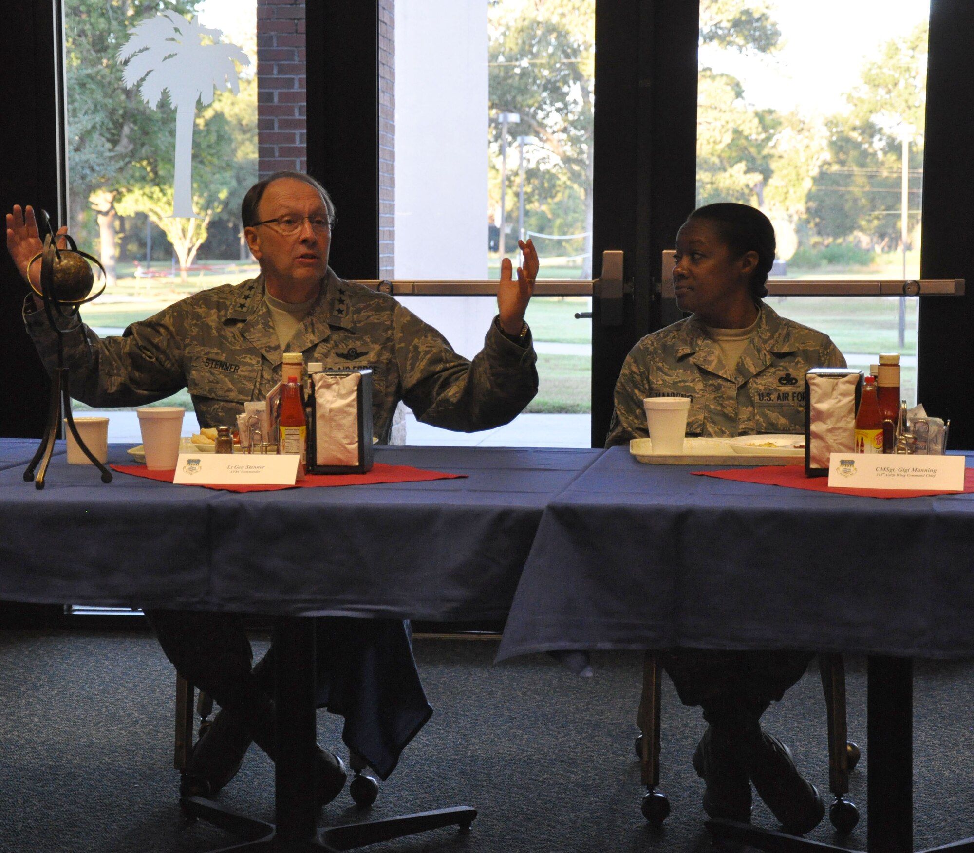 Lt. Gen. Charles Stenner, AFRC commander, shares a few moments of his time during breakfast with Chief Master Sgt. Gigi Manning, 315 AW command chief master sergeant, Oct. 4, 2011 at Joint Base Charleston, S.C. (U.S. Air Force photo\Staff Sgt. Shane Ellis)