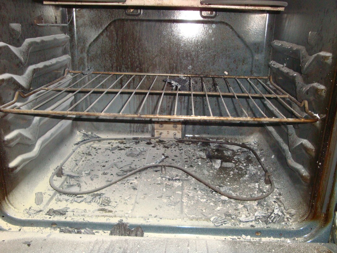 This stove in base housing at Langley Air Force Base, Va., was damaged when a pizza box left in it caught on fire Oct. 3, 2011. The 633rd Civil Engineer Squadron Fire Prevention office said cooking fires are a major concern, and they hope to educate residents during Fire Prevention Week Oct. 10-14. (Courtesy photo)