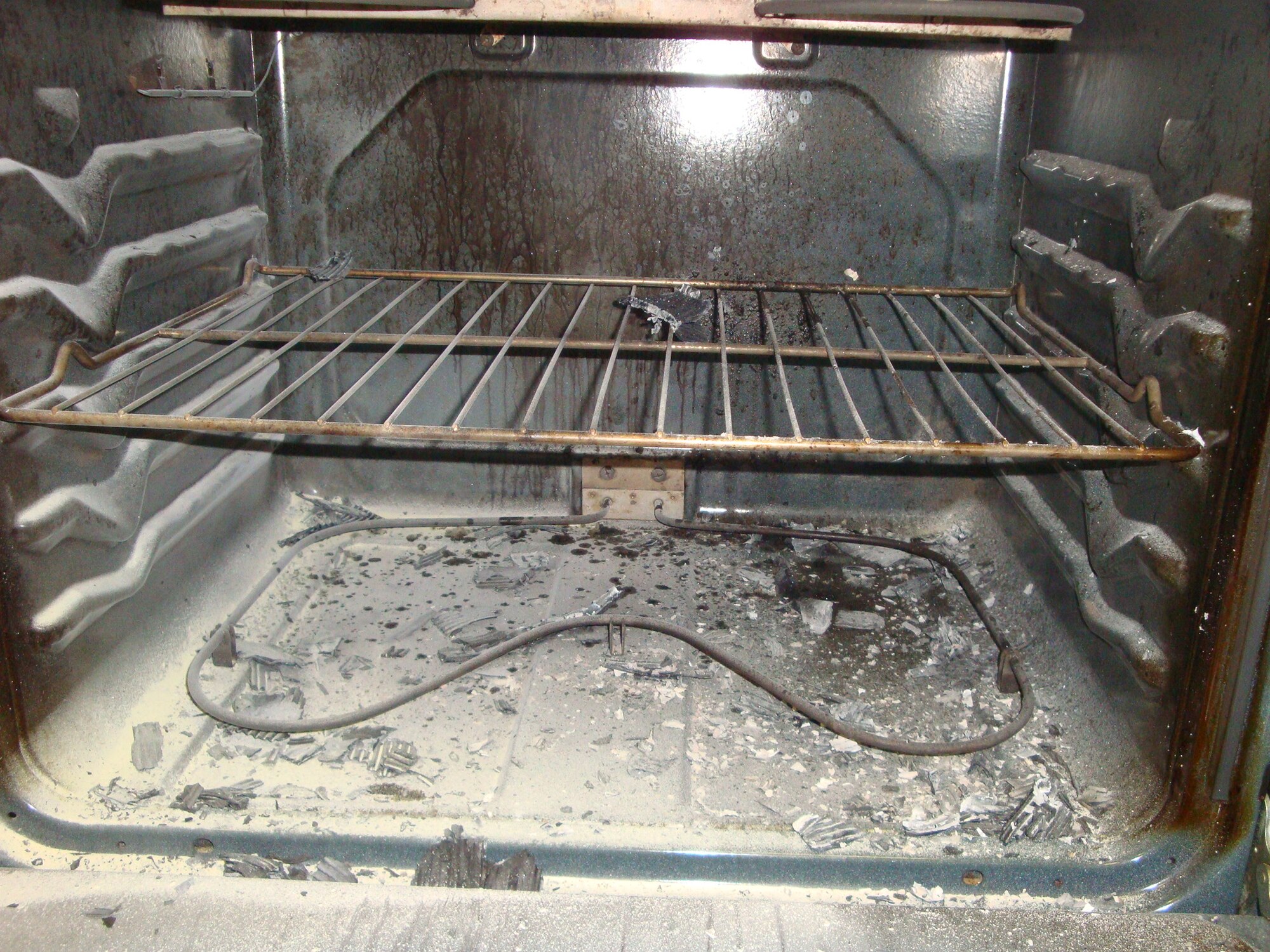 This stove in base housing at Langley Air Force Base, Va., was damaged when a pizza box left in it caught on fire Oct. 3, 2011. The 633rd Civil Engineer Squadron Fire Prevention office said cooking fires are a major concern, and they hope to educate residents during Fire Prevention Week Oct. 10-14. (Courtesy photo)