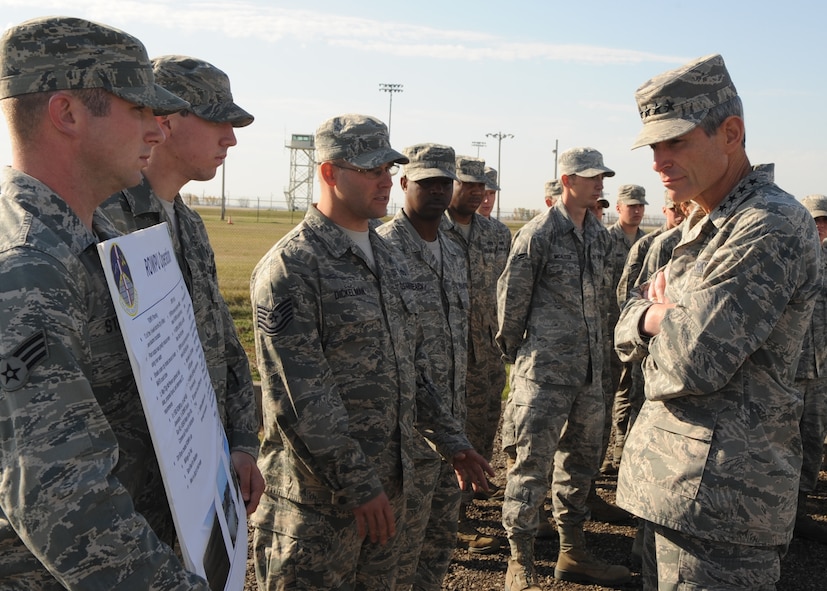 Air Force Chief Staff Gen. Norton Schwartz speaks to Airmen Oct. 4, 2011, during a tour of Minot Air Force Base, N.D. Schwartz was briefed on the importance of the reverse osmosis water purification units during the 2011 Souris River flooding of Minot, N.D., and the surrounding communities. The Airmen are assigned to the 5th Civil Engineer Squadron. (U.S. Air Force photo/Senior Airman Aaron-Forrest Wainwright)