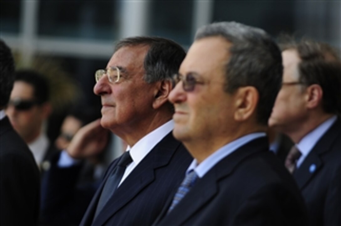 Secretary of Defense Leon E. Panetta, left, and Israeli Minister of Defense Ehud Barak stand for the playing of the U.S. national anthem during an honor cordon ceremony for Panetta’s arrival in Tel Aviv, Israel, on Oct. 3, 2011. Panetta is traveling in the Middle East to meet with key allies in the region to discuss a variety of defense related issues. 