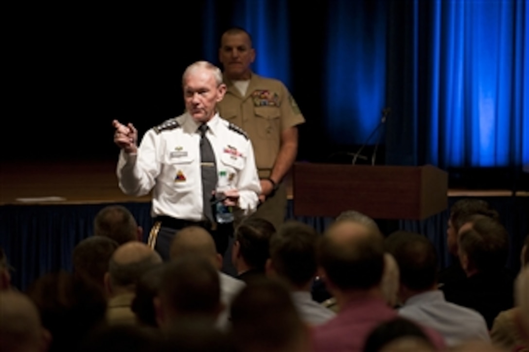 Chairman of the Joint Chiefs of Staff Gen. Martin E. Dempsey, U.S. Army, talks to members of the Joint Staff at a town hall type meeting in the Pentagon in Arlington, Va., on Oct. 3, 2011.  Dempsey and Senior Enlisted Advisor to the Chairman Marine Corps Sgt. Maj. Bryan B. Battaglia took questions from the staff during the meeting.  
