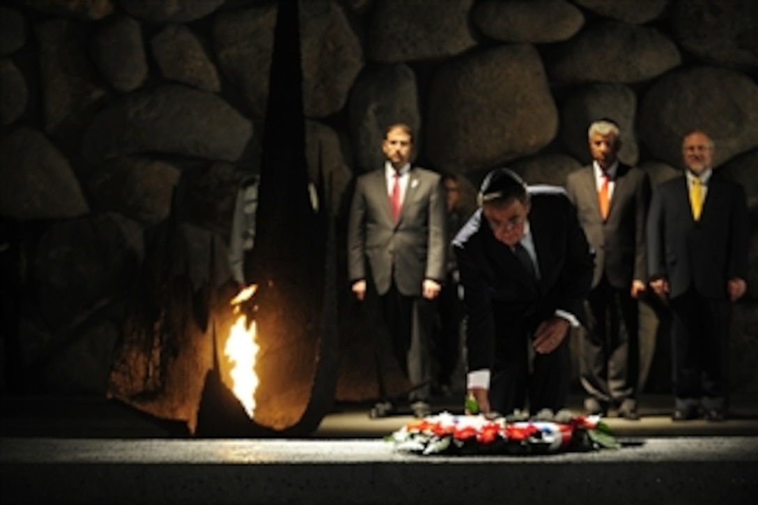 Secretary of Defense Leon Panetta lays a wreath in remembrance of six million Jews murdered during the Holocaust at the Holocaust Museum in Yad Vashem, Israel, on Oct. 3, 2011. Panetta is traveling in the Middle East to meet with key allies in the region to discuss a variety of defense related issues.  