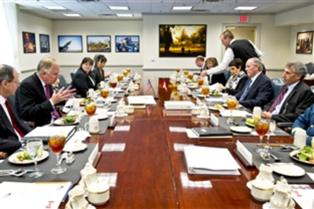 Deputy Defense Secretary William J. Lynn III, second from left, hosts a working lunch for Canadian Deputy Defense Minister Robert Fonberg and Deputy Public Safety Minister William V. Baker at the Pentagon, Oct. 5, 2011.