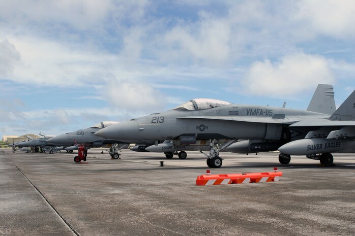 F/A-18 aircraft from Marine Fighter Attack Squadron 115 stage on the flightline as more aircraft from Strike Fighter Squadron 94 arrive to begin training with VMFA-115 in the coming weeks. Marines from Marine Aviation Logistics Squadron 12, VMFA-115 and sailors from VFA-94 will be working together to until the training ends in November.