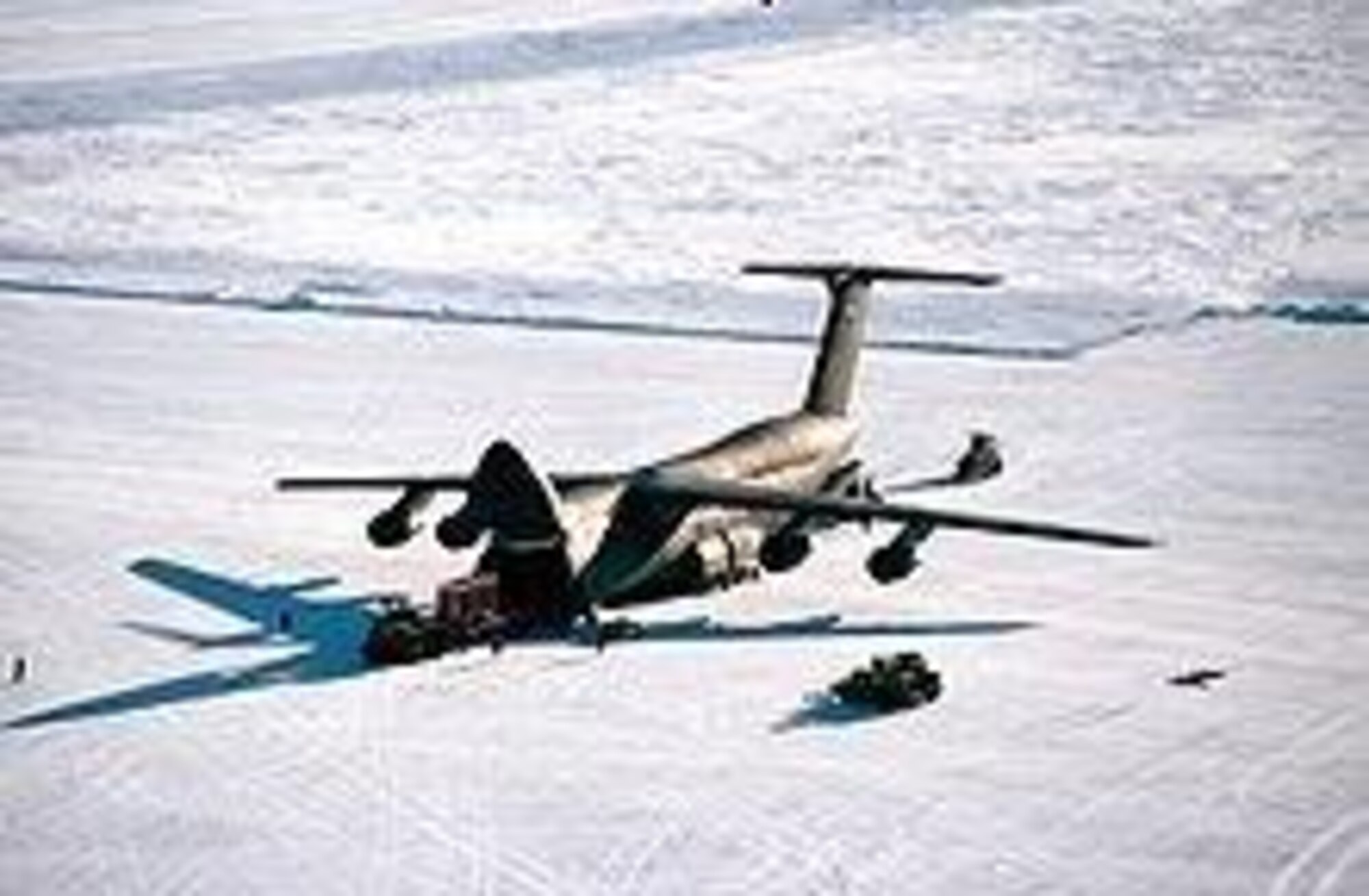C-5 Galaxy is unloaded in Antarctica. Travis landed the first such aircraft there in this week in 1989. (U.S. Air Force photo)